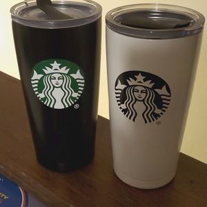 2 20oz Starbucks stainless travel mugs with white and black coding on outside